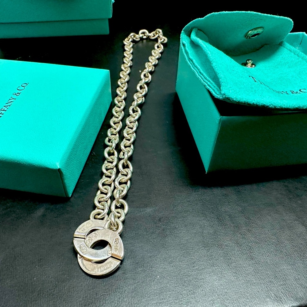 Tiffany's clasp necklace and bracelet set. Barely used.